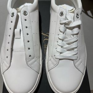 Brand new white and gold sneakers, never worn.For dress up and dress down!